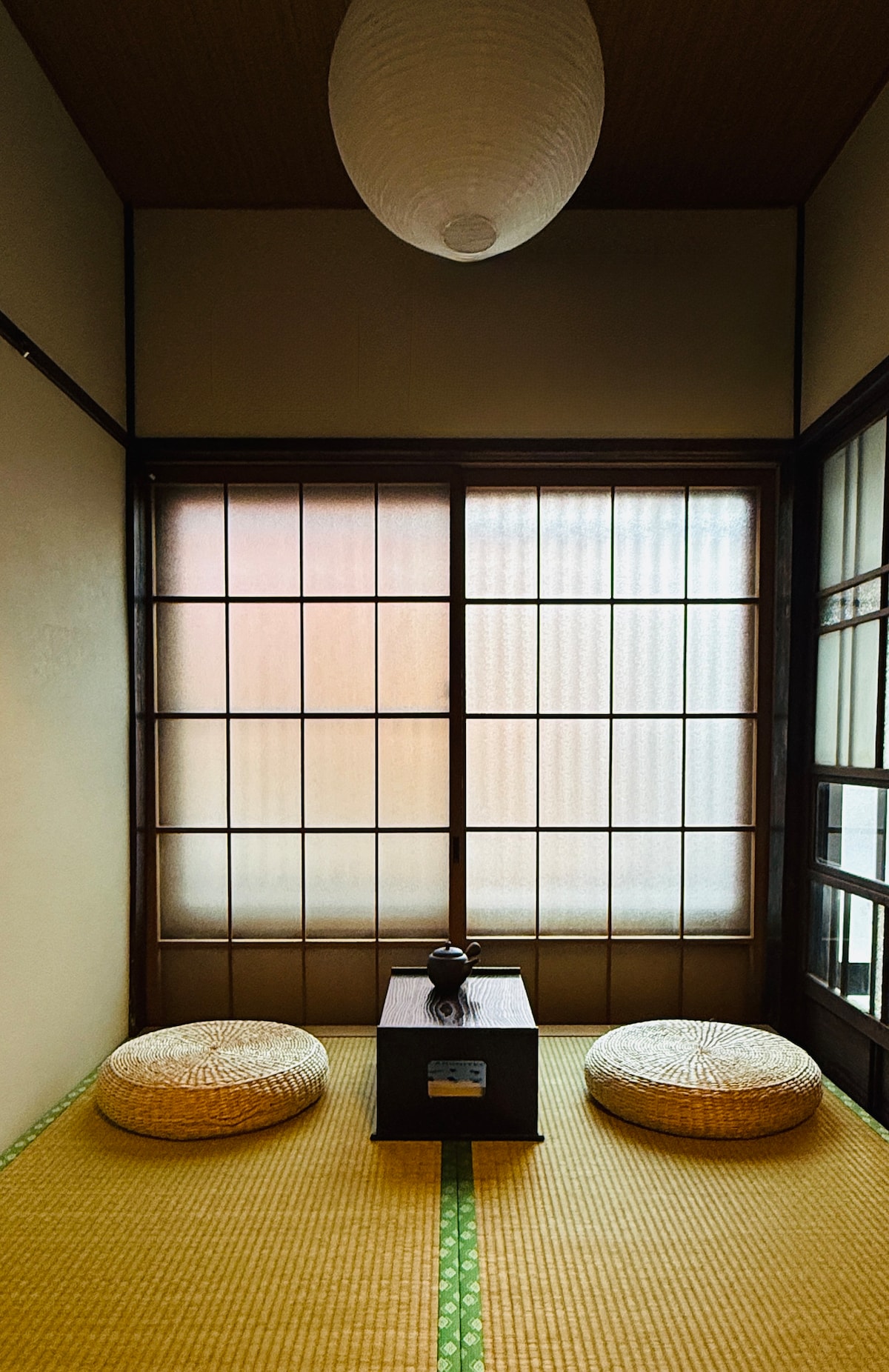 Paper lantern and wooden lattice window details